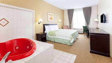 Deluxe Studio Suite, 1 King Bed, Non Smoking | Desk, laptop workspace, blackout curtains, iron/ironing board