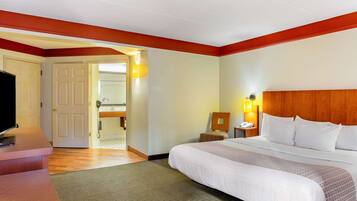 Suite, 1 King Bed, Non Smoking | Down duvets, desk, iron/ironing board, free cots/infant beds