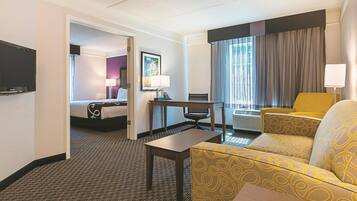 Deluxe Suite, 1 Bedroom, Non Smoking | Premium bedding, desk, laptop workspace, iron/ironing board