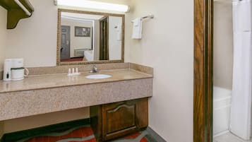Combined shower/tub, jetted tub, free toiletries, hair dryer