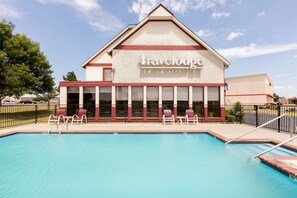 Outdoor pool, open 9:00 AM to 9:00 PM, pool umbrellas, sun loungers