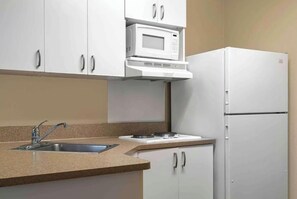 Full-size fridge, microwave, stovetop