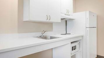 Studio, 1 Queen Bed, Accessible, Non Smoking | Private kitchen | Fridge, microwave, stovetop, coffee/tea maker