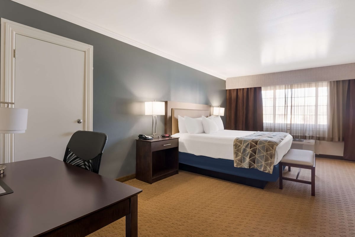 Suite, 1 King Bed, Non Smoking, Jetted Tub | Premium bedding, down comforters, pillowtop beds, desk