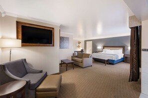 Suite, 1 King Bed, Non Smoking, Jetted Tub (Spa Tub) | 1 bedroom, premium bedding, down comforters, pillowtop beds