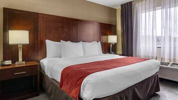 Suite, 1 King Bed, Non Smoking | Hypo-allergenic bedding, desk, iron/ironing board