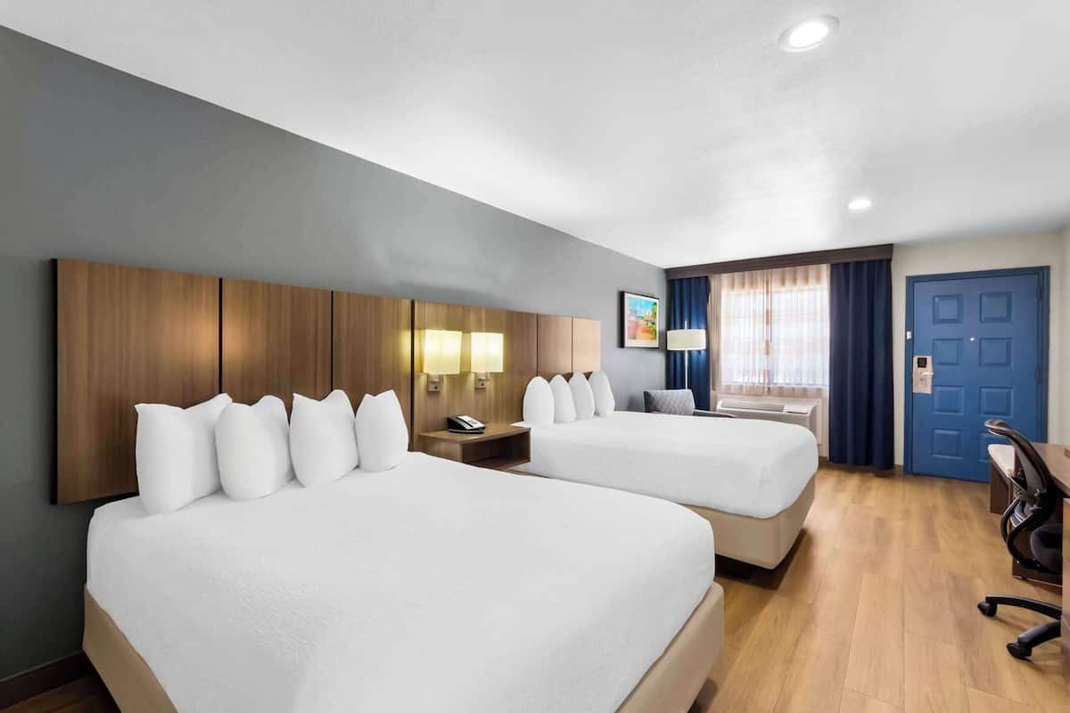 Pillow-top beds, desk, laptop workspace, iron/ironing board