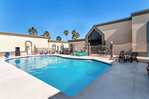 Outdoor pool, open 9:00 AM to 9:00 PM, pool umbrellas, sun loungers