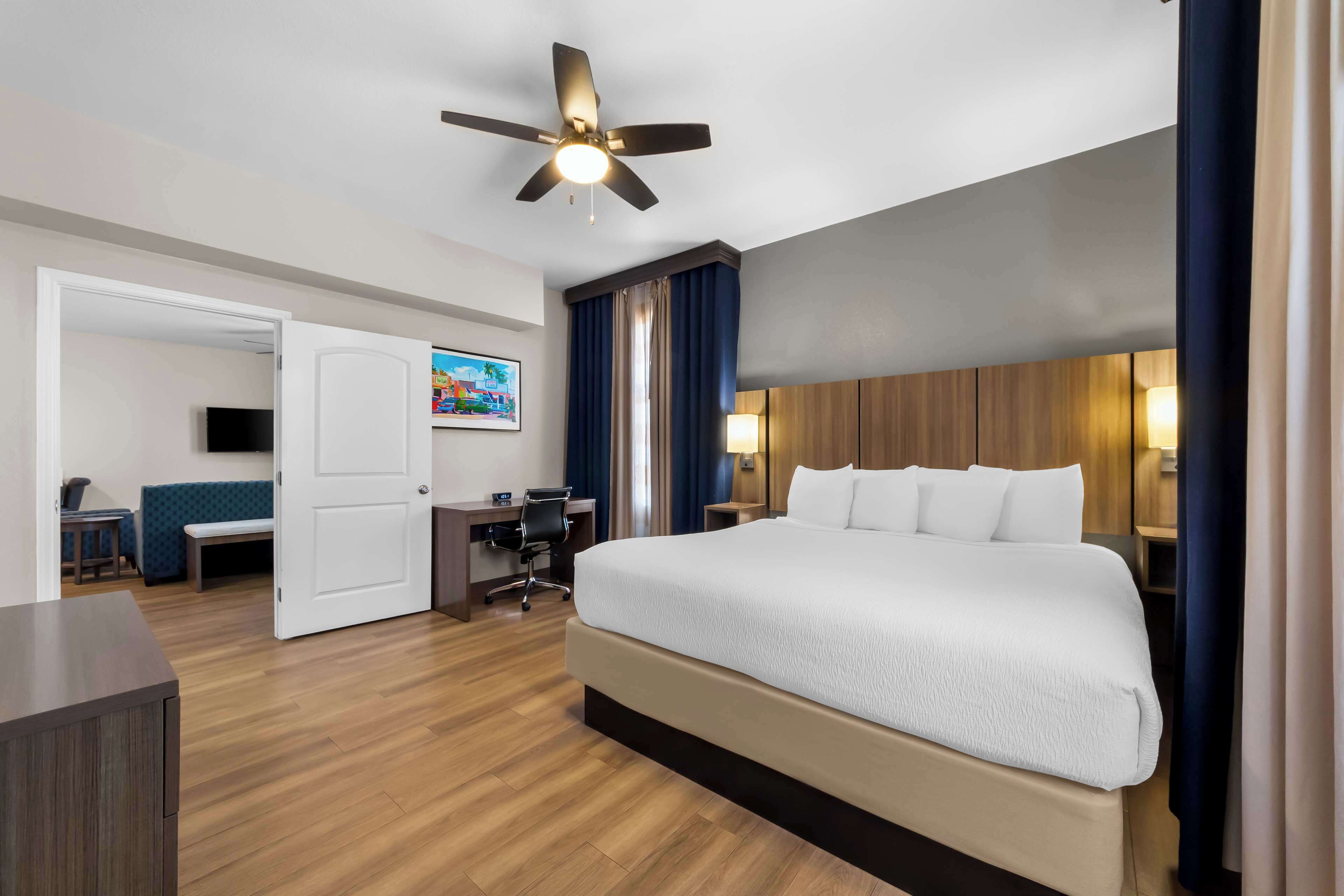 suite, 1 king bed, non smoking, kitchenette (living room;with sofabed) | pillow-top beds, desk, laptop workspace, iron/ironing board