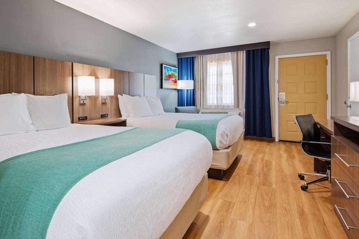Pillowtop beds, desk, laptop workspace, iron/ironing board