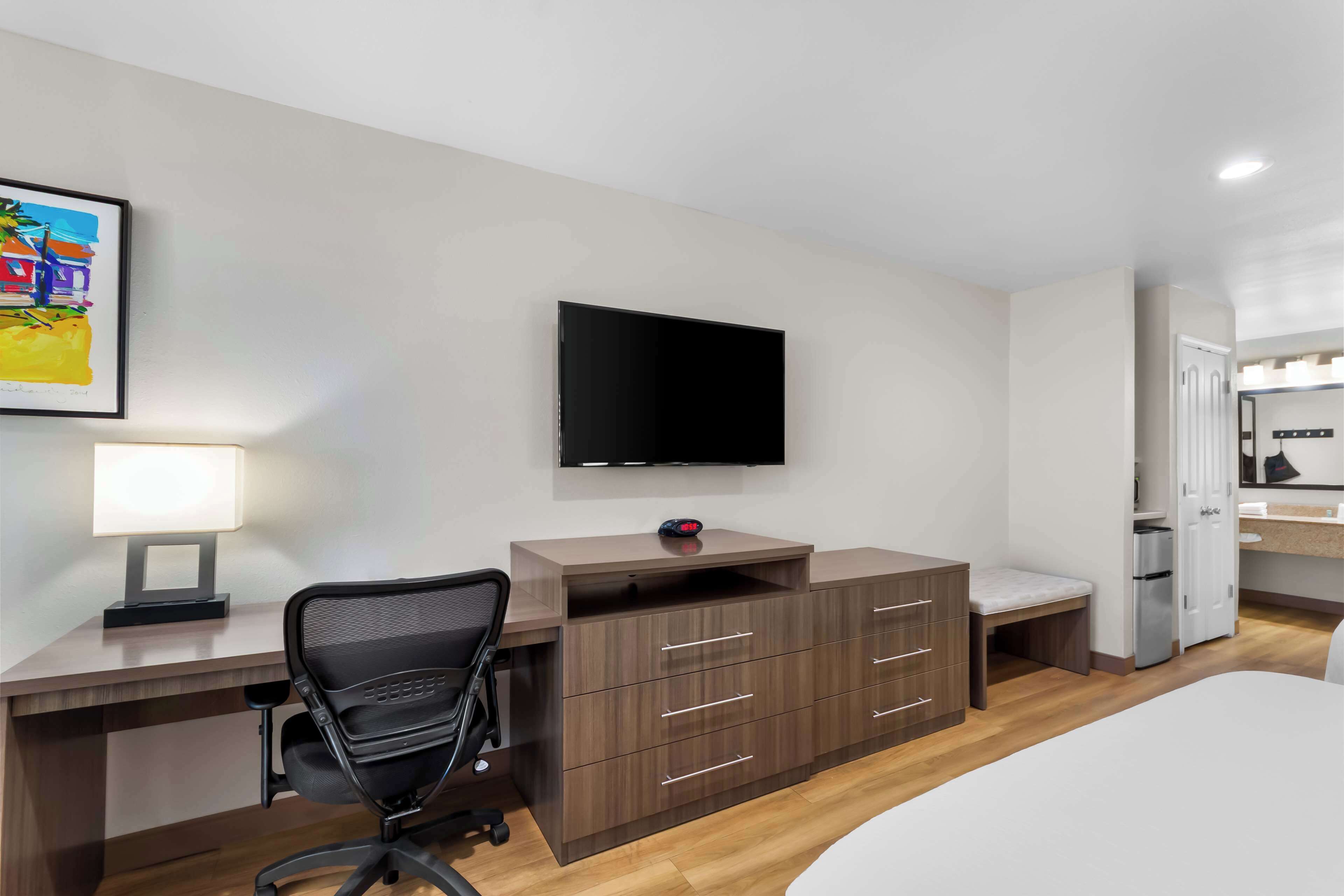 pillow-top beds, desk, laptop workspace, iron/ironing board