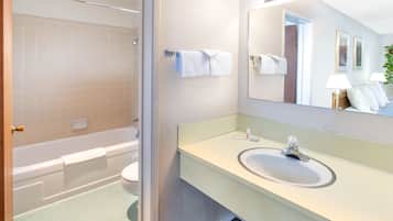 Bathtub, hair dryer, towels