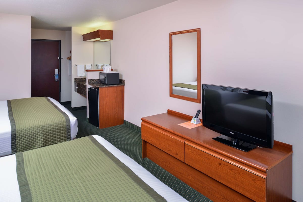 Room, 2 Queen Beds, Non Smoking (Pet-Friendly) | Desk, iron/ironing board, free cribs/infant beds, rollaway beds