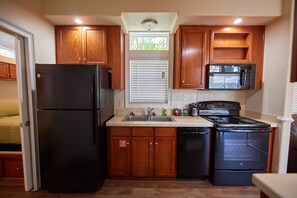 Elite Cottage, 2 Bedrooms (Linens Included) | Private kitchen | Fridge, microwave, oven, stovetop