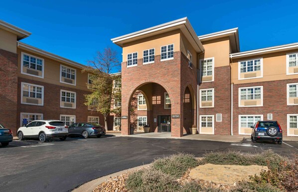 Stunning residential building with a central entrance and arched doorway.