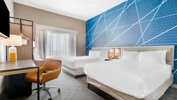 Desk, laptop workspace, blackout drapes, iron/ironing board