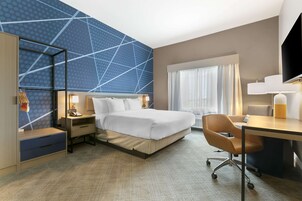 Desk, blackout drapes, iron/ironing board, rollaway beds