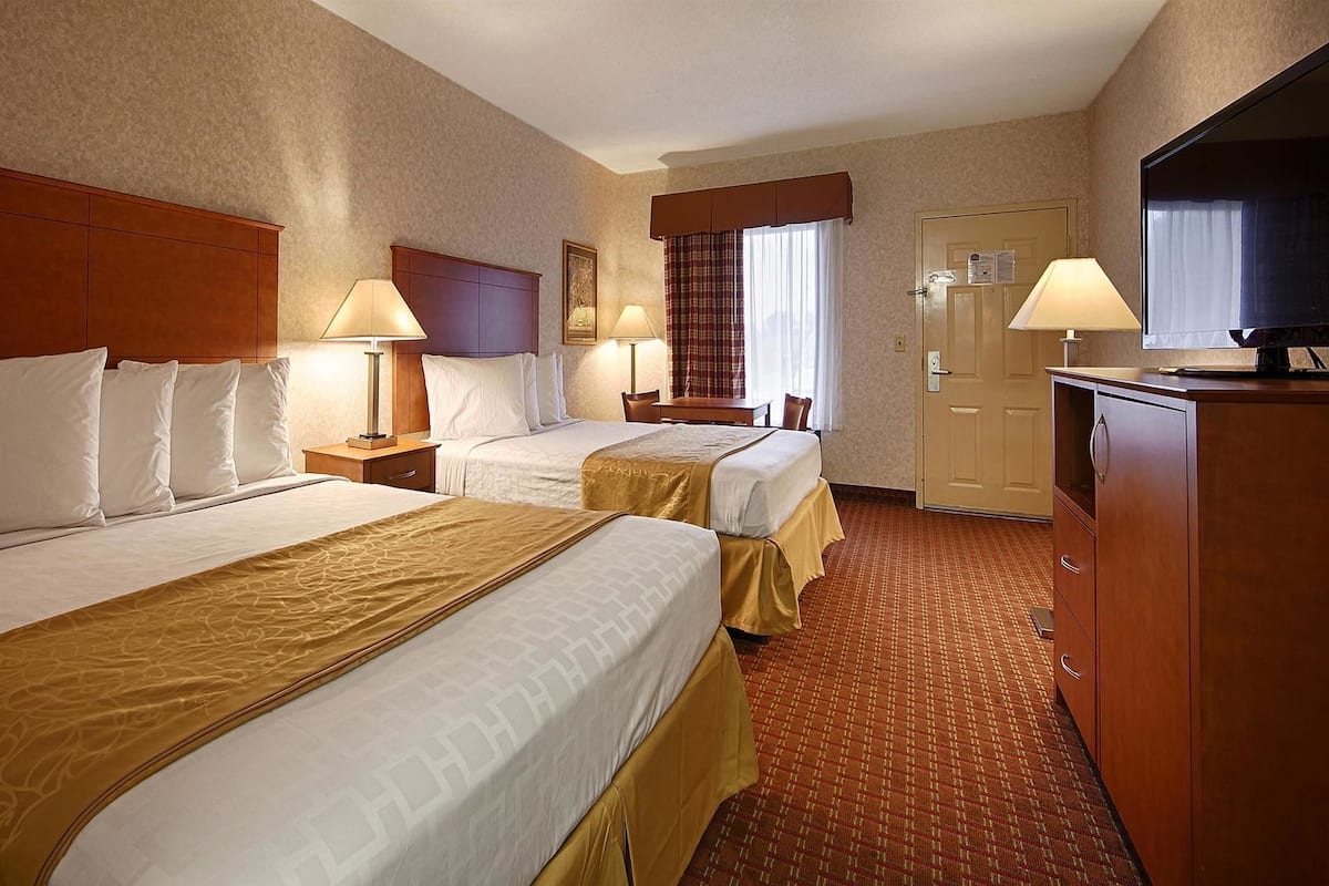 Desk, iron/ironing board, free cribs/infant beds, rollaway beds