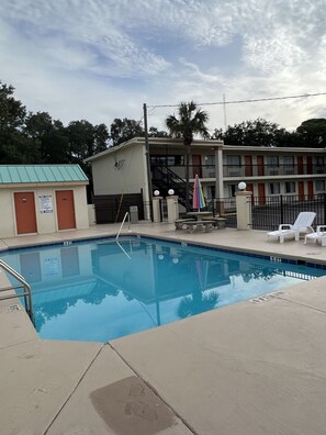 Guests can enjoy a refreshing swim in the pool surrounded by a spacious deck.