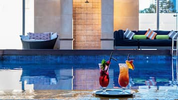 Outdoor pool, open 7:00 AM to 7:00 PM, sun loungers