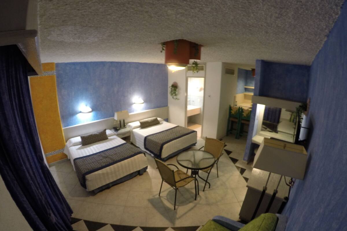 Habitación superior, 2 camas dobles, balcón | Vistas desde la habitación