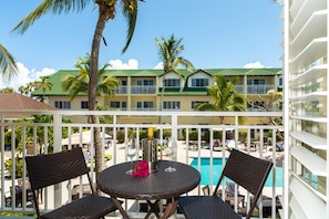 Deluxe Poolside Balcony - 1 King Bed | 1 bedroom, in-room safe, iron/ironing board, free WiFi