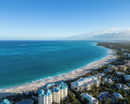 White sand, free beach shuttle, sun loungers, beach umbrellas