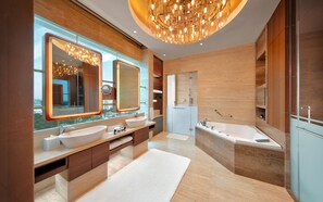 Presidential Suite | Bathroom | Designer toiletries, hair dryer, slippers, towels
