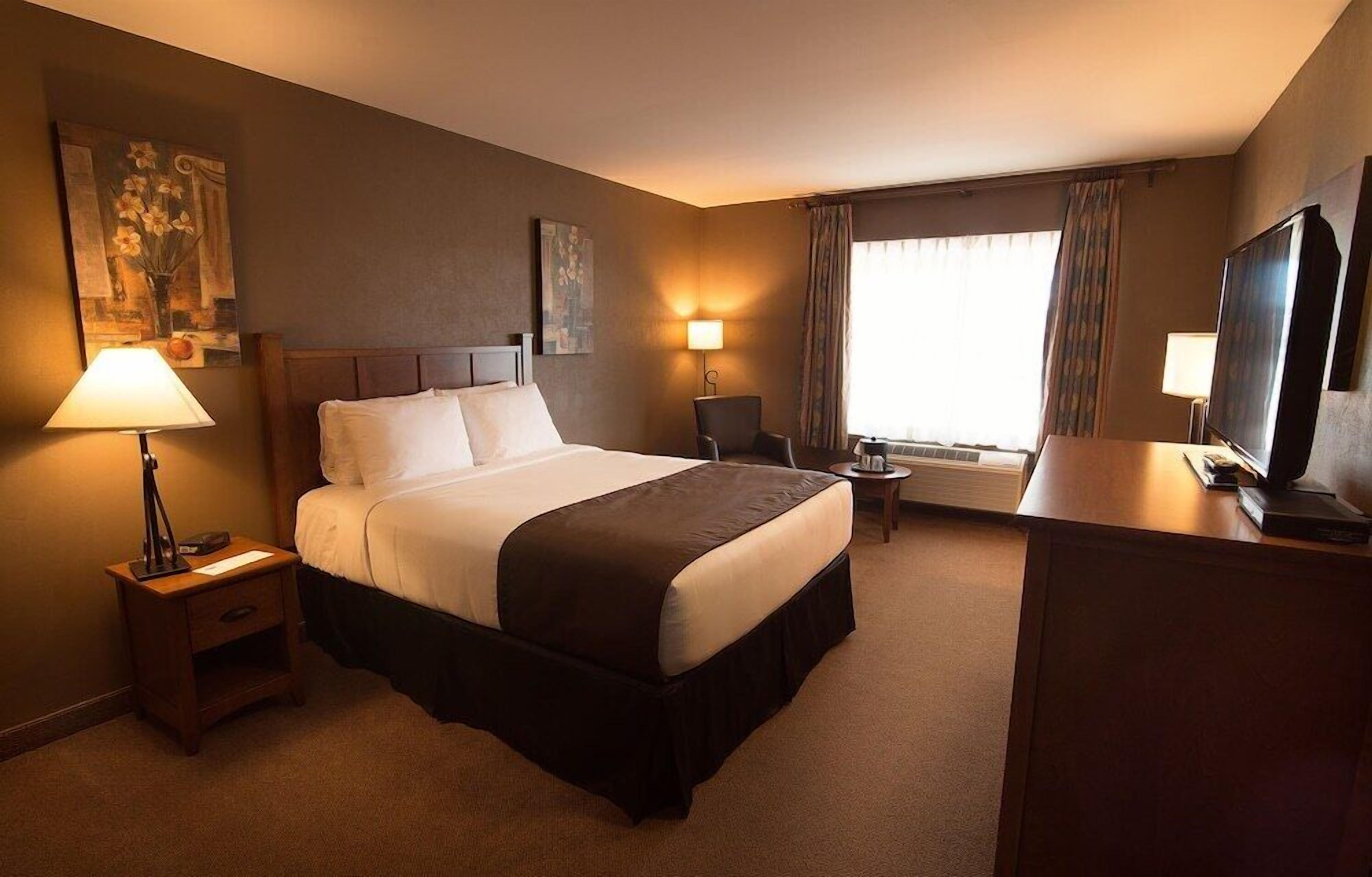 Premium bedding, pillow-top beds, desk, blackout curtains