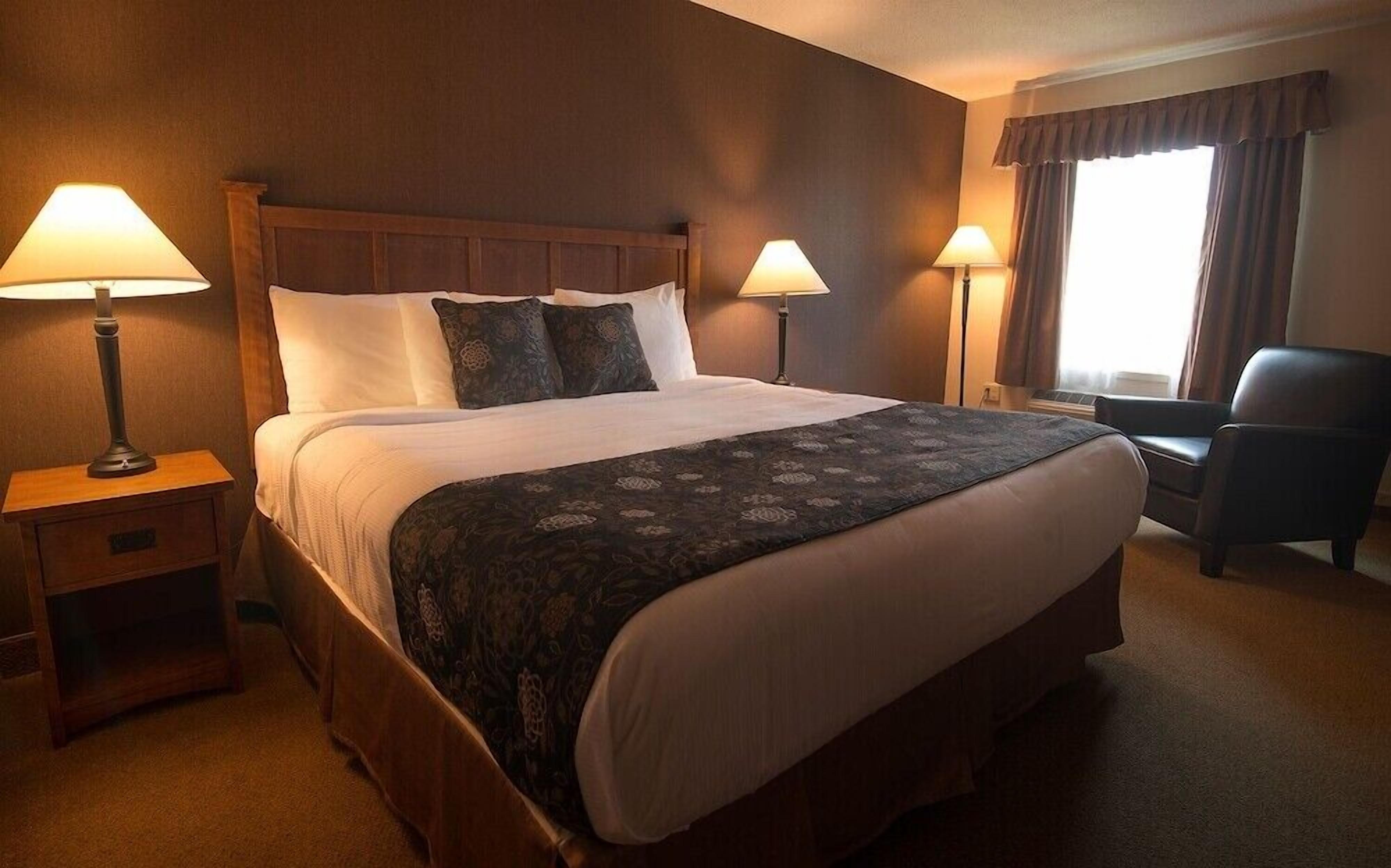 Premium bedding, pillow-top beds, desk, blackout curtains