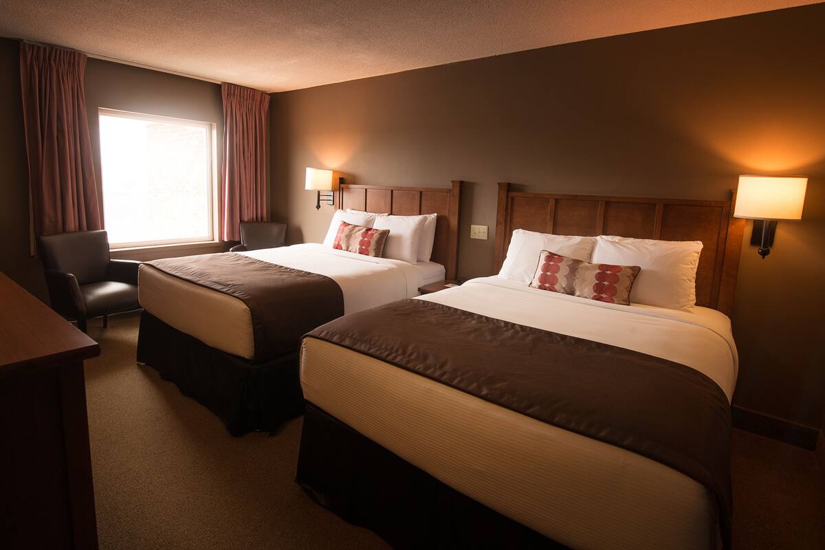 Premium bedding, pillowtop beds, desk, blackout drapes