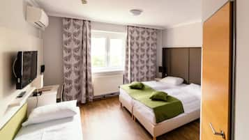 Triple Room | Select Comfort beds, minibar, in-room safe, individually decorated