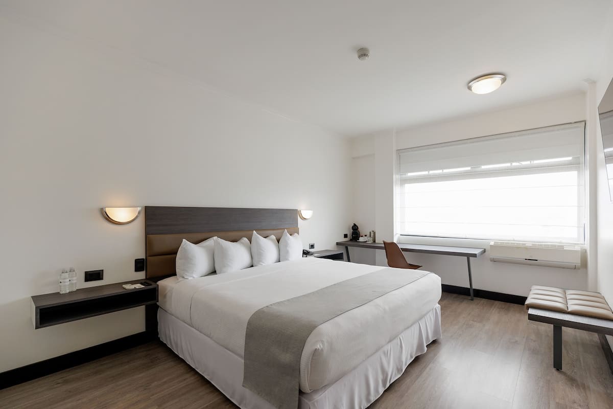 Executives & Travelers 1 King bed | Premium bedding, down comforters, in-room safe, desk