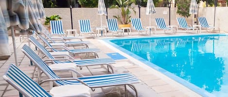 Outdoor pool, pool umbrellas, pool loungers