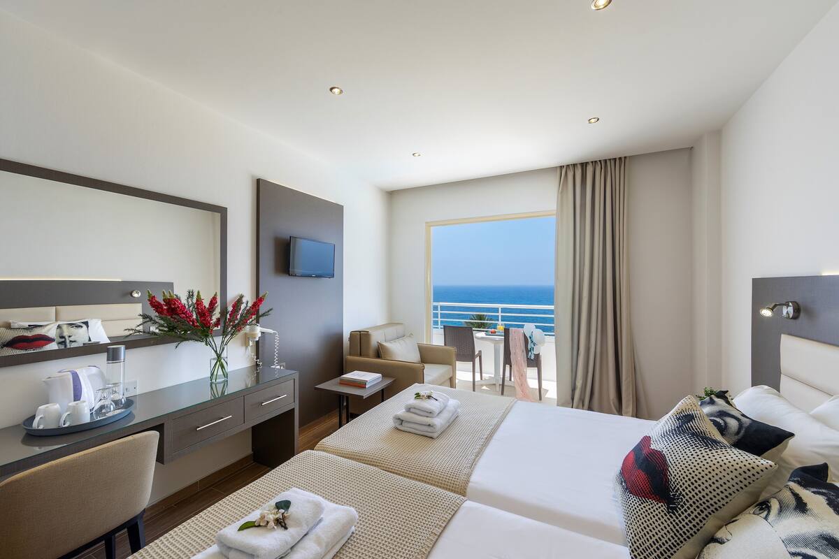 Double or Twin Room, 1 Double or 2 Twin Beds, Sea View | In-room safe, blackout drapes, WiFi (surcharge), bed sheets