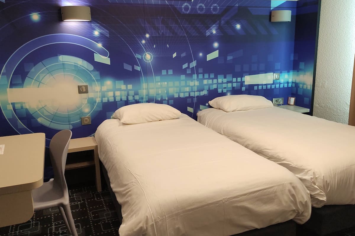 standard room, 2 single beds | desk, blackout curtains, soundproofing, iron/ironing board