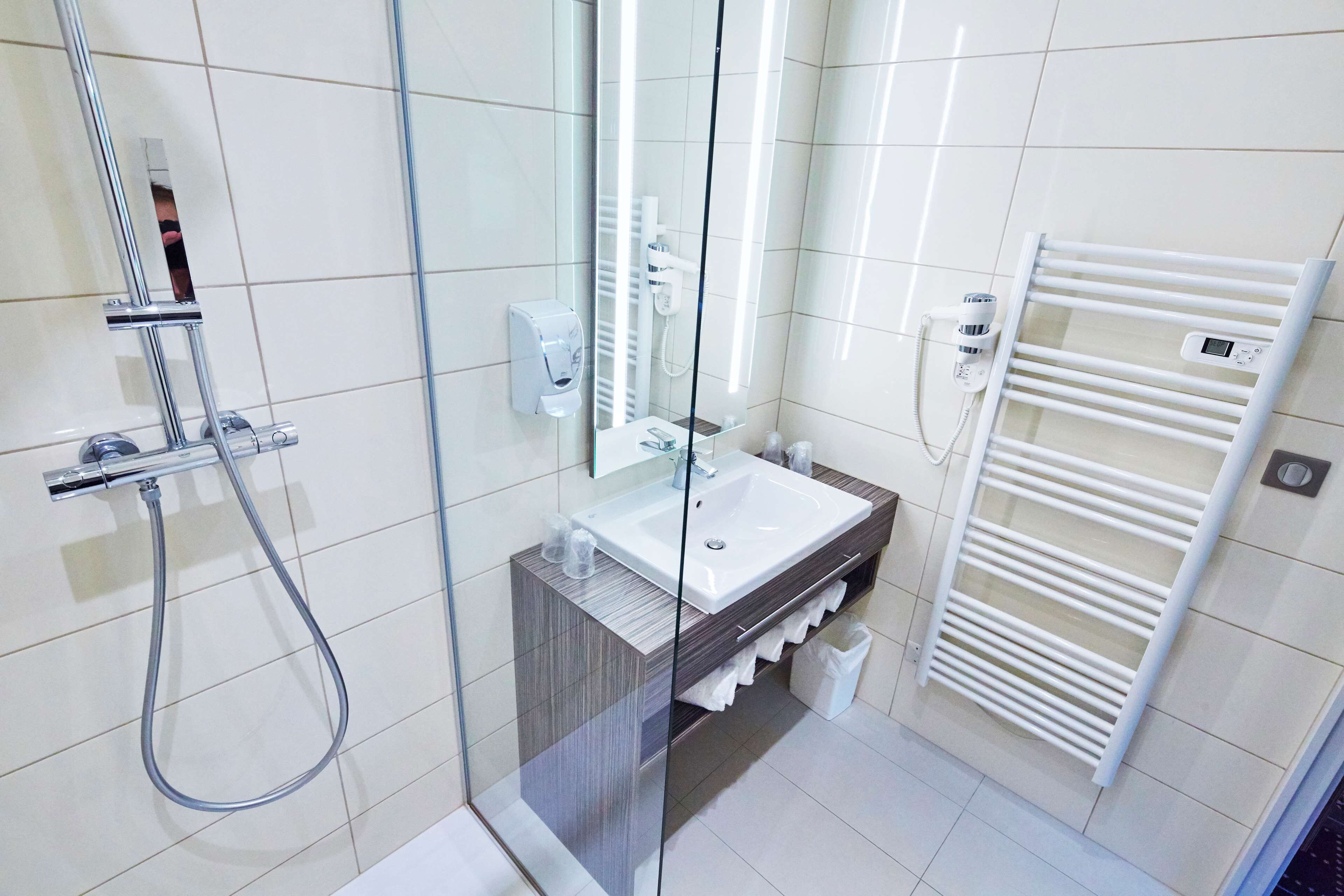 shower, eco-friendly toiletries, hair dryer, towels