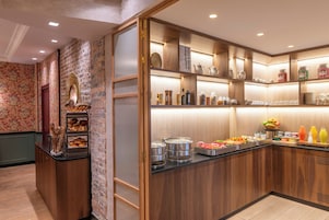 Daily buffet breakfast (EUR 14 per person)