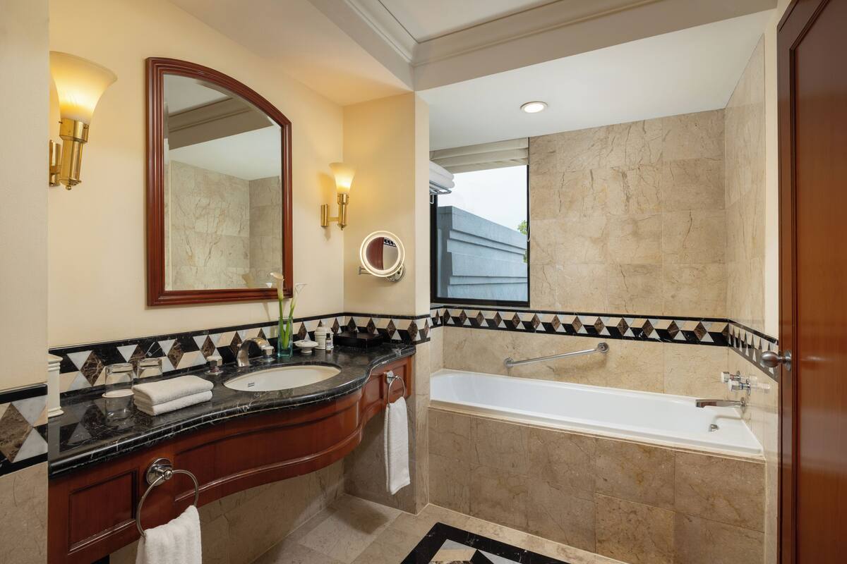 combined shower/bathtub, free toiletries, hair dryer, bathrobes