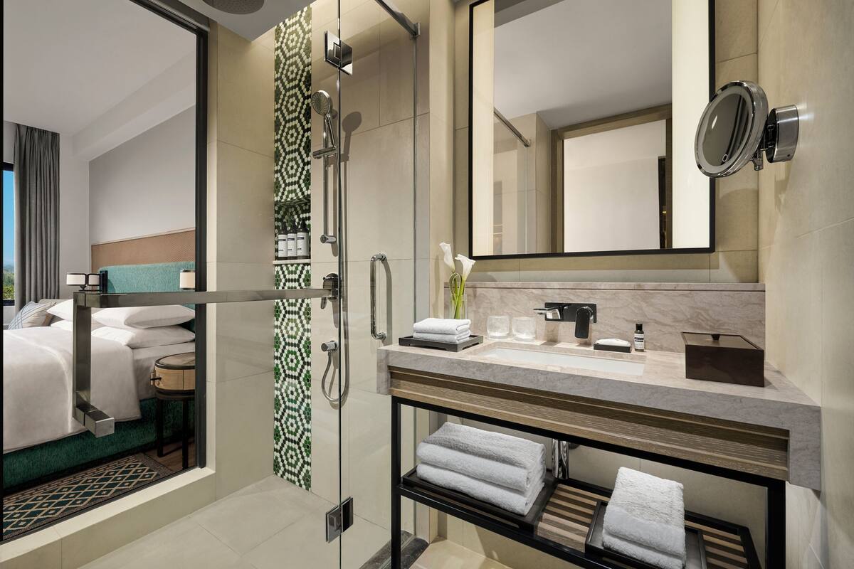 combined shower/bathtub, free toiletries, hair dryer, bathrobes