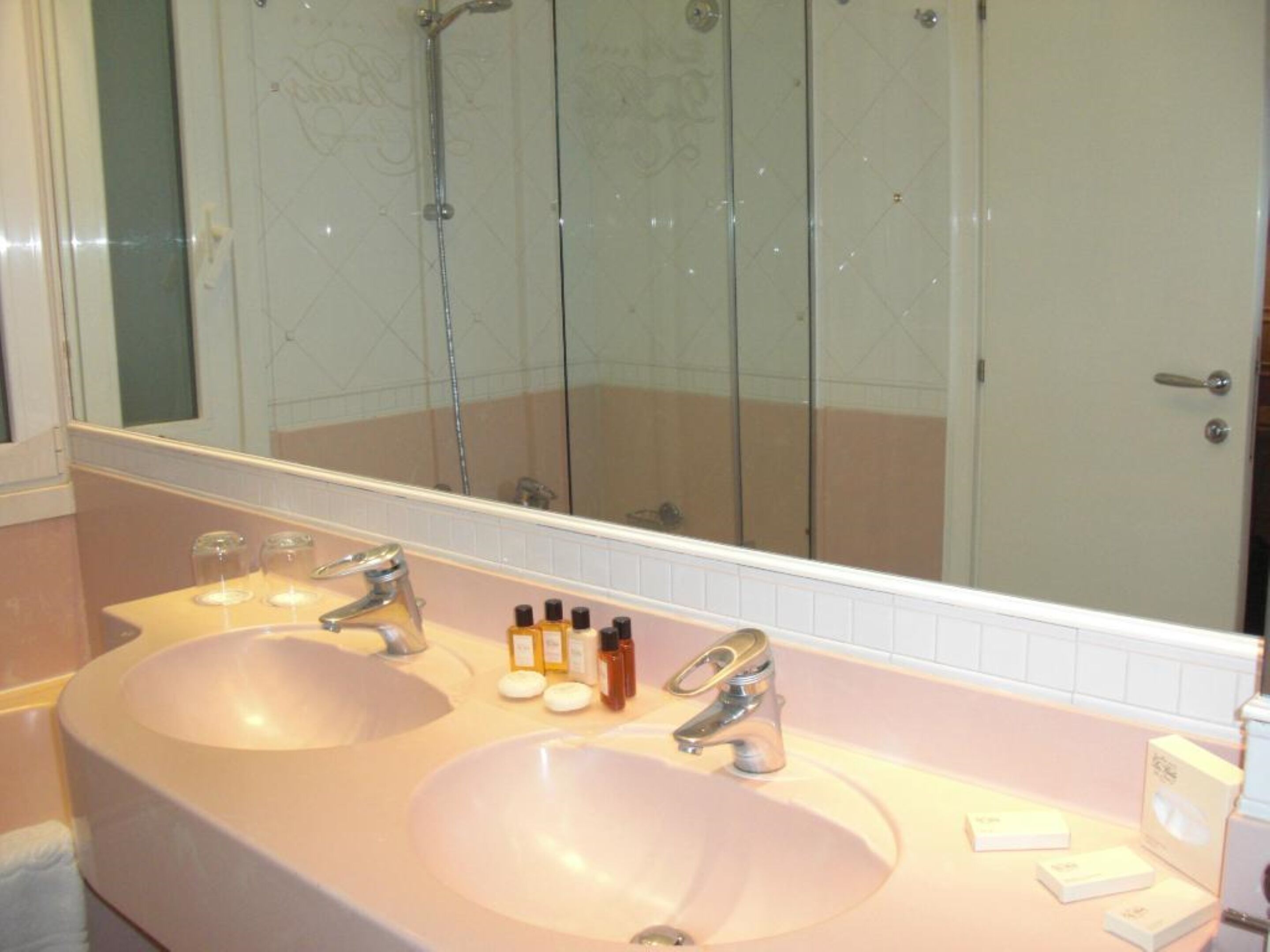 hair dryer, bathrobes, slippers, bidet