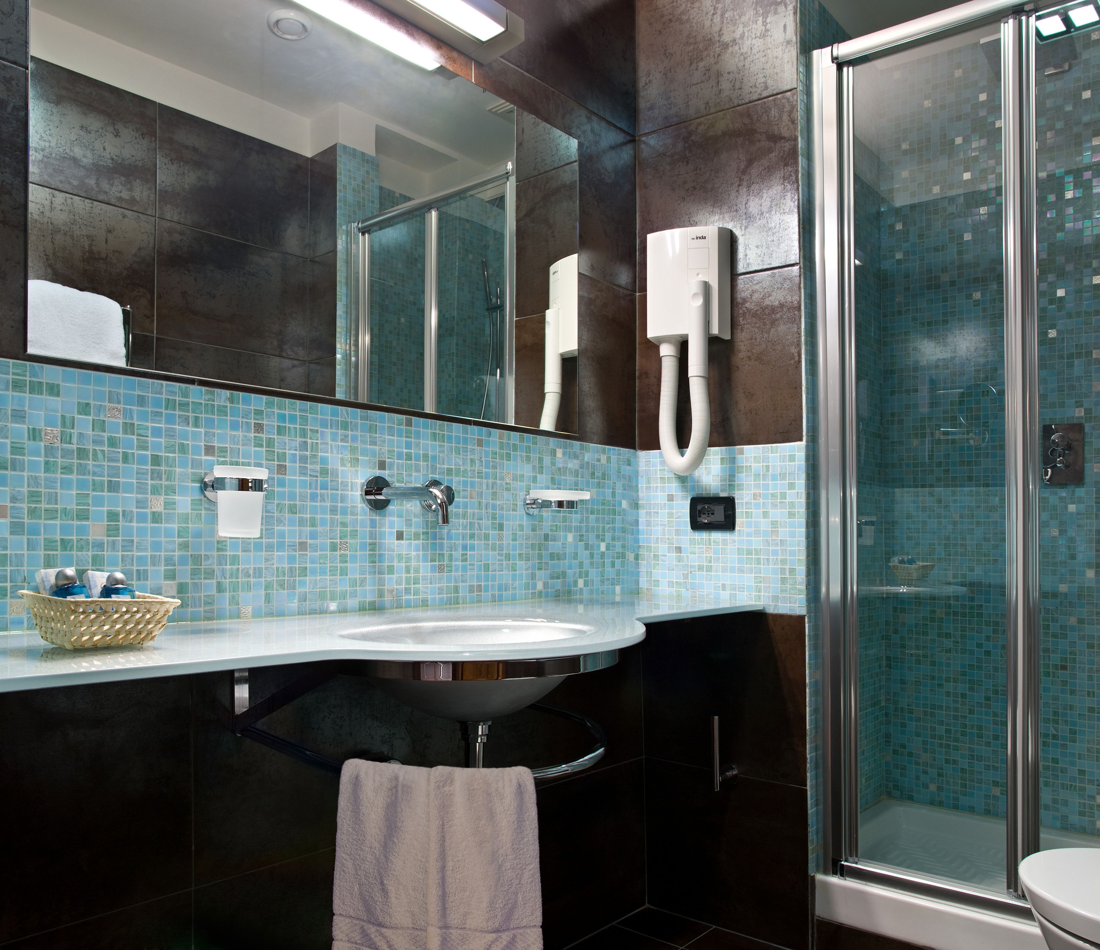 free toiletries, hair dryer, bidet, towels