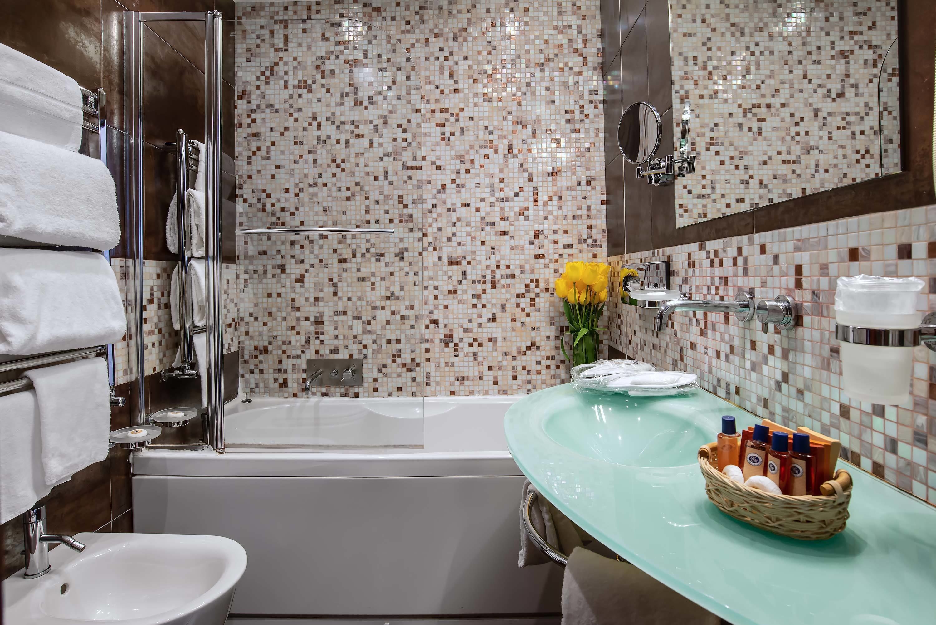 free toiletries, hair dryer, bidet, towels