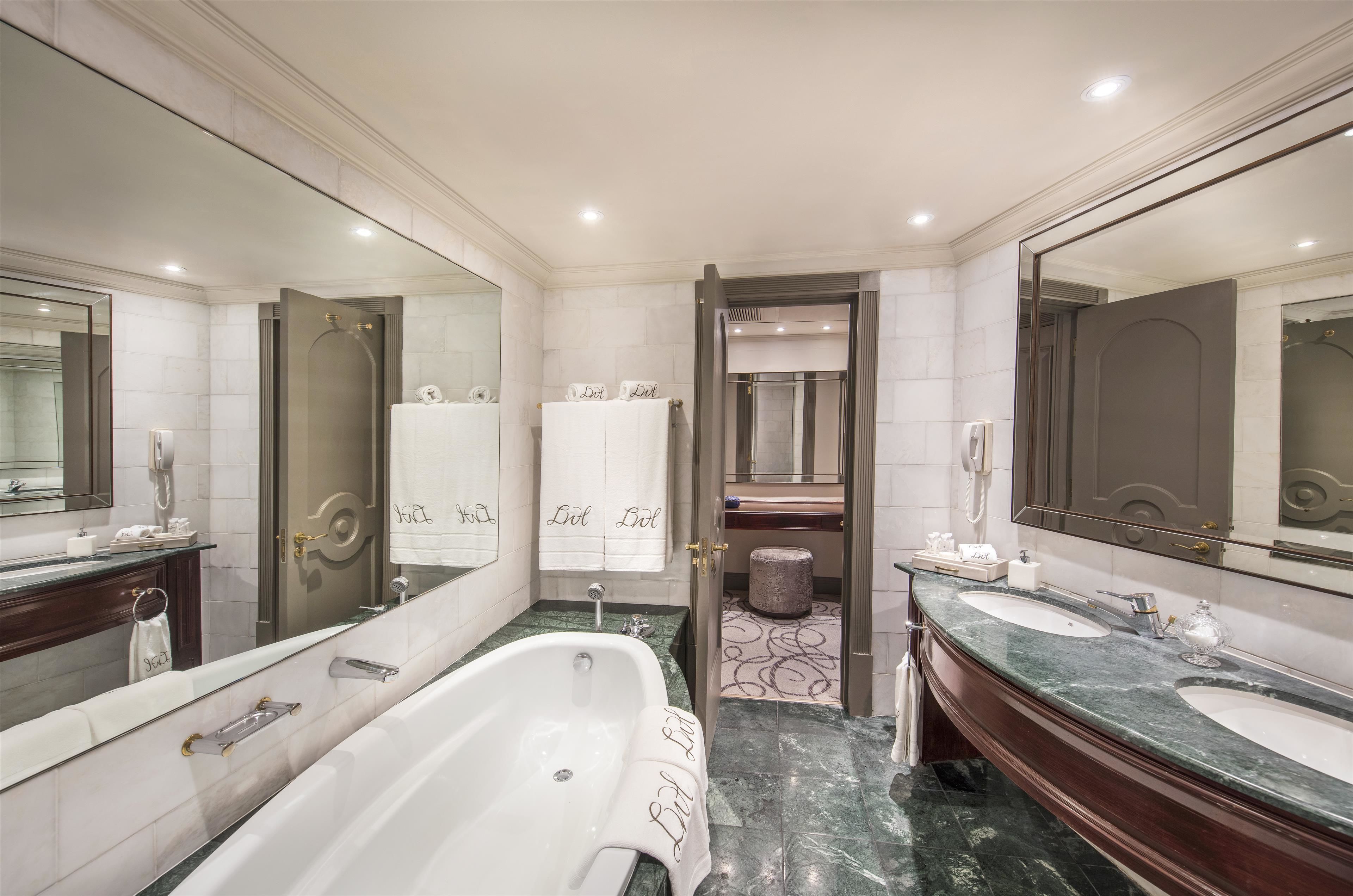 prestige suite | bathroom | separate bathtub and shower, free toiletries, hair dryer, bathrobes