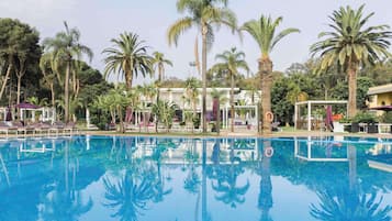 Indoor pool, 2 outdoor pools, open 9:00 AM to 6:00 PM, pool umbrellas
