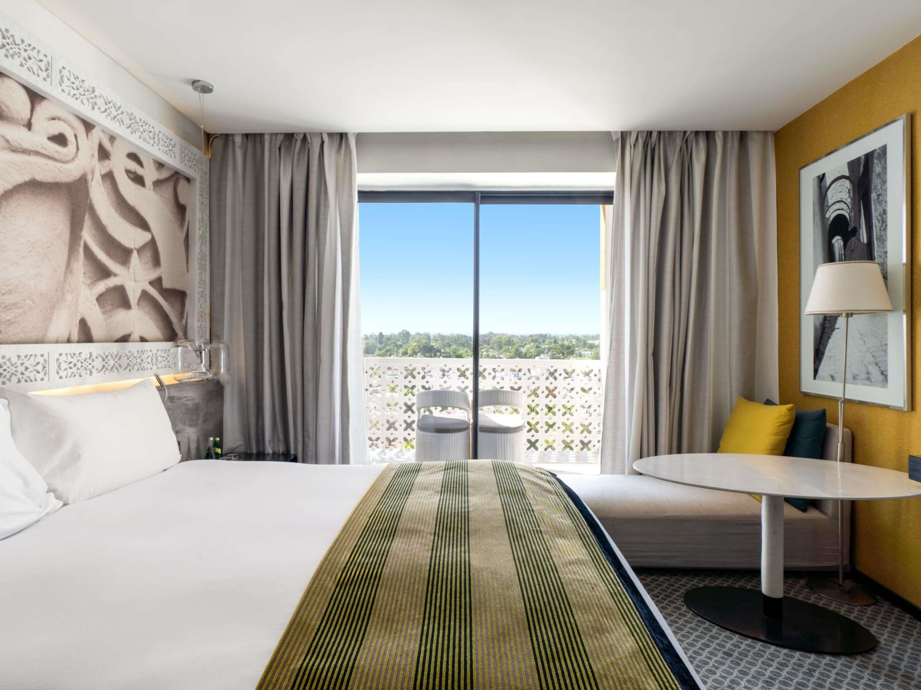 Premium bedding, minibar, in-room safe, laptop workspace