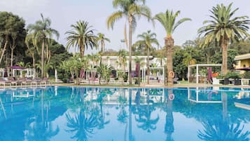 Indoor pool, 2 outdoor pools, open 9:00 AM to 6:00 PM, pool umbrellas