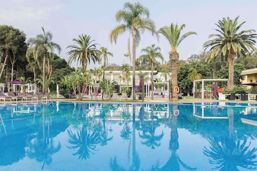 Indoor pool, 2 outdoor pools, open 9:00 AM to 6:00 PM, pool umbrellas