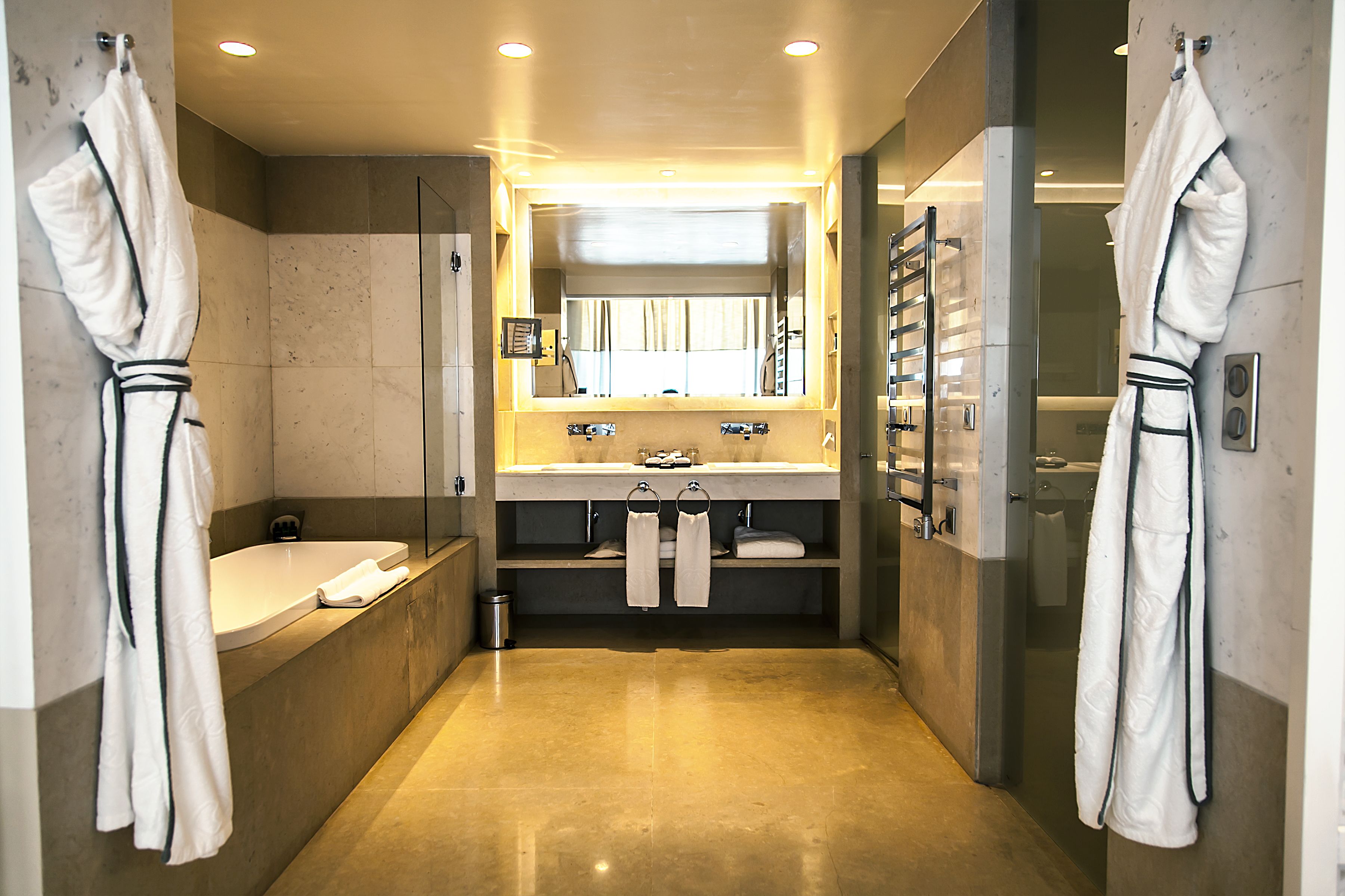 junior suite, 1 king bed, club lounge access | bathroom | designer toiletries, hair dryer, bathrobes, slippers