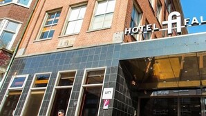 A hotel facade with a prominent sign for 'Hotel Falcon Plaza'. - Hotel Falcon Plaza (Amsterdam)
